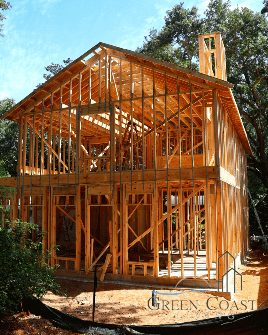 Two-story timber frame house under construction