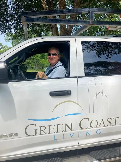 Green Coast Living president Lance Lamb in his work truck